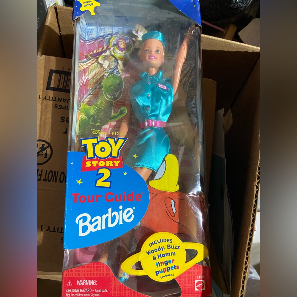 BNIB Barbie Toy Story 2 Tour Guide Doll in Teal Outfit with Pink Belt